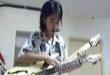 Funny videos : Kid on 2 guitars